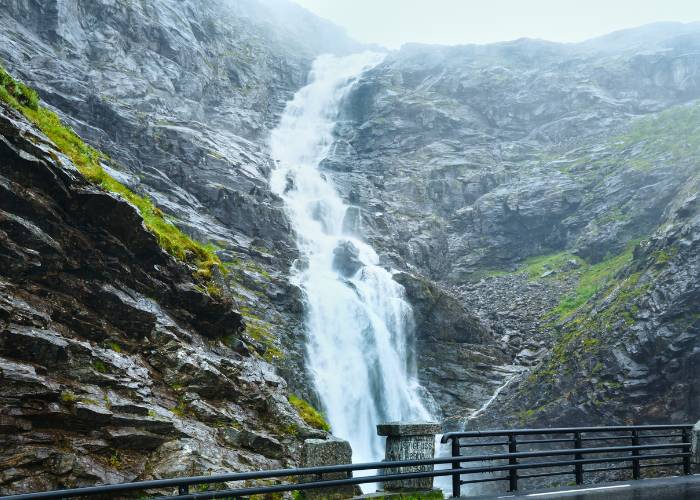 The Stigfossen waterfall, shrouded in mist, on the Trollstigen road between Geiranger and Åndalsnes in northwestern Norway.